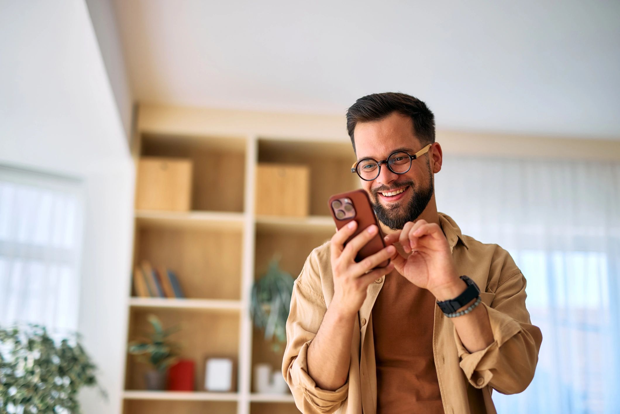 Person using a smartphone, focused on the screen